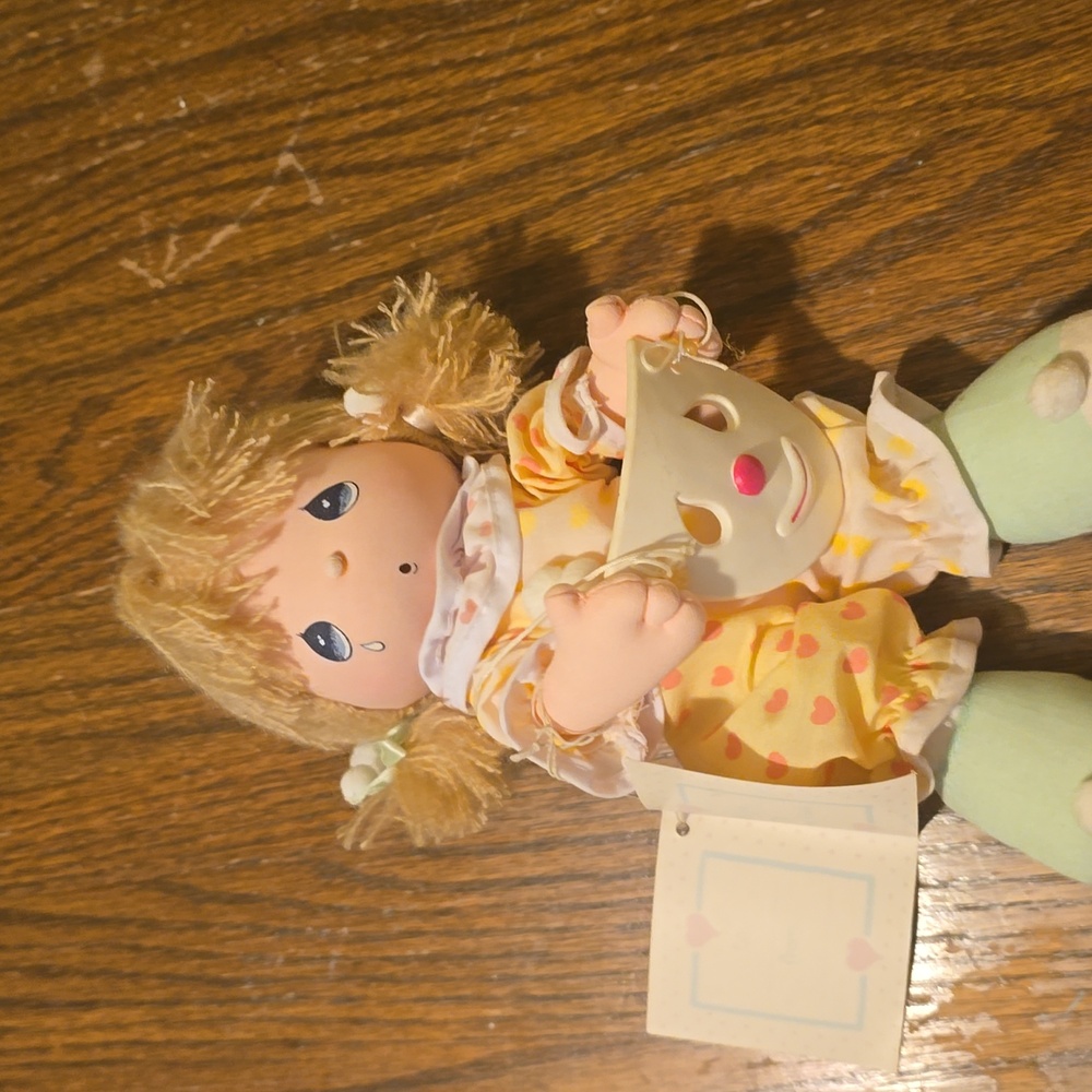Adorable Precious Moments Doll in Yellow Jumper With Mask.
